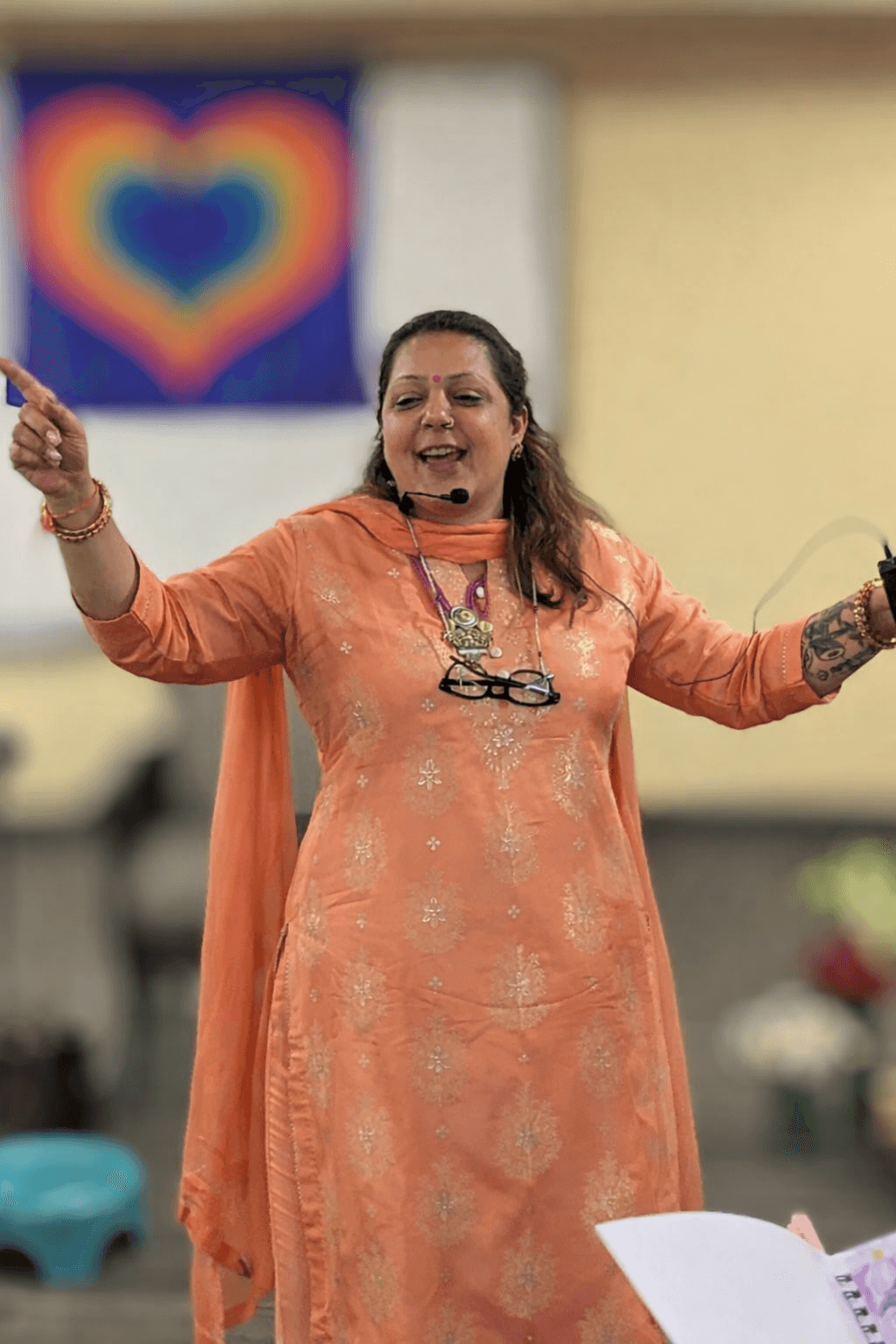 Nataasha S Bhasin speaking at a healing session